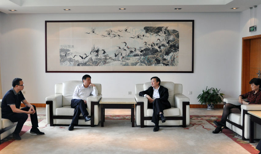 校长程纯会见羌毅一行.jpg